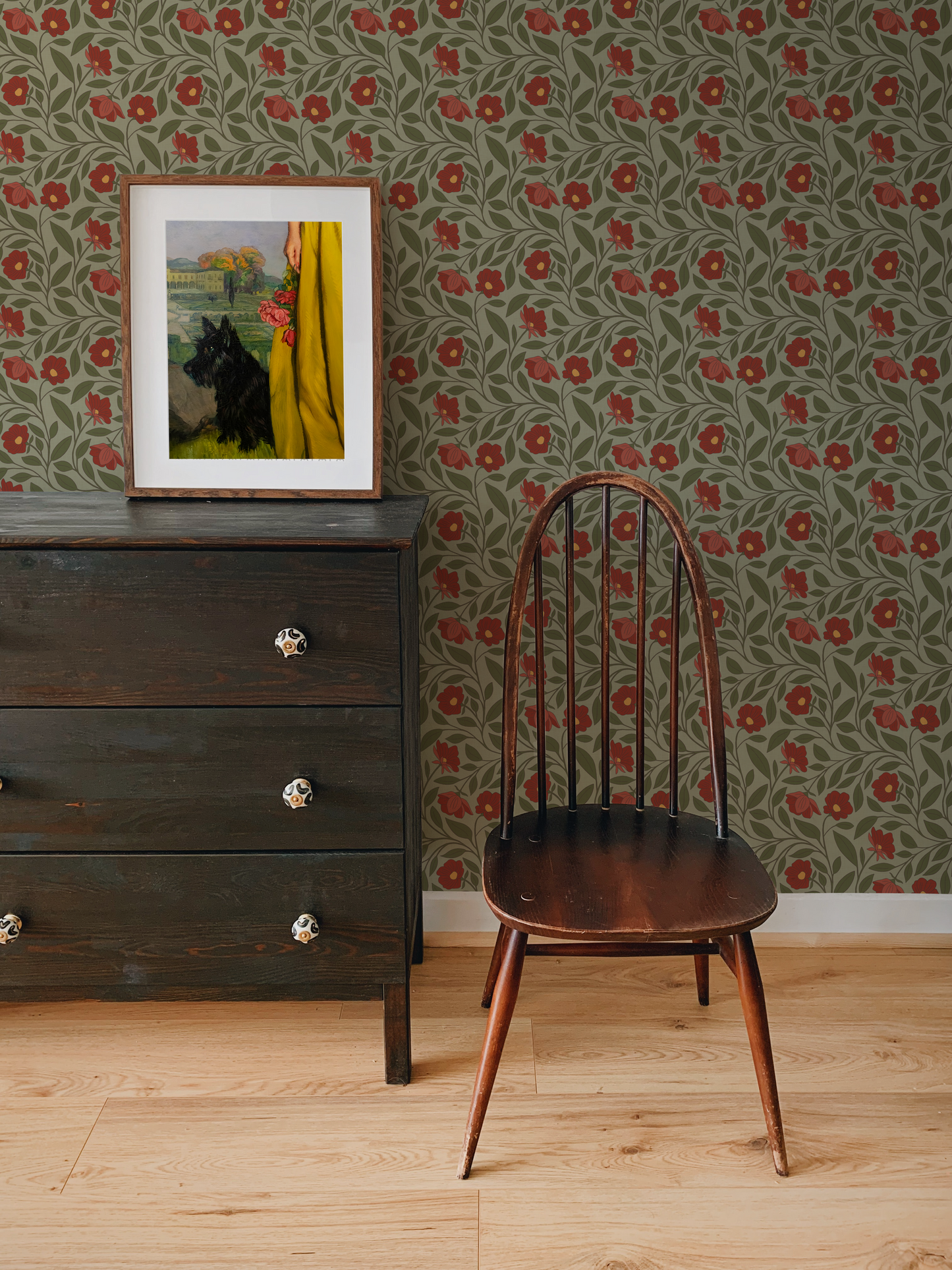 Wooden chair in front of a dresser with floral wallpaper